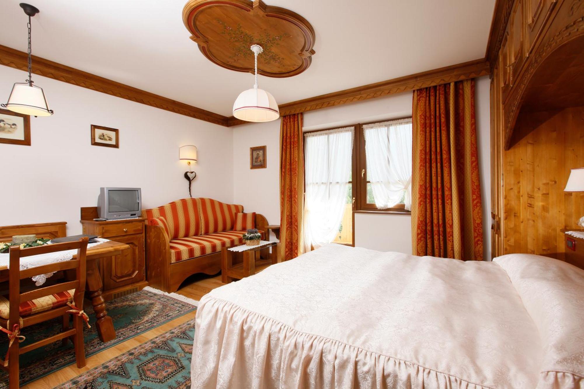 Hotel Columbia & Spa コルティーナ・ダンペッツォ 部屋 写真
